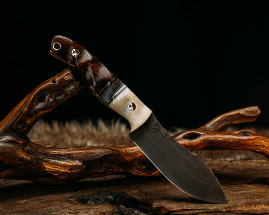 Warbird, Feather Light, Skinner Jr. Set- Giraffe Bone, Black G10 and Brass Pin Striping, Red, White and Blue Canvas Micarta Split, Brass Patriot Pins, Brass Lanyard Pin (Feather Light Only), Textured Grip