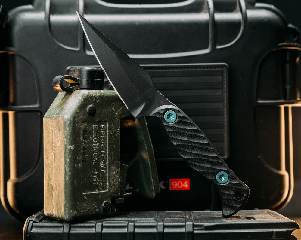 Gulo Gulo- Black G10, Armor Black Cerakote, Green Ti Allen Bolts, Textured Grip