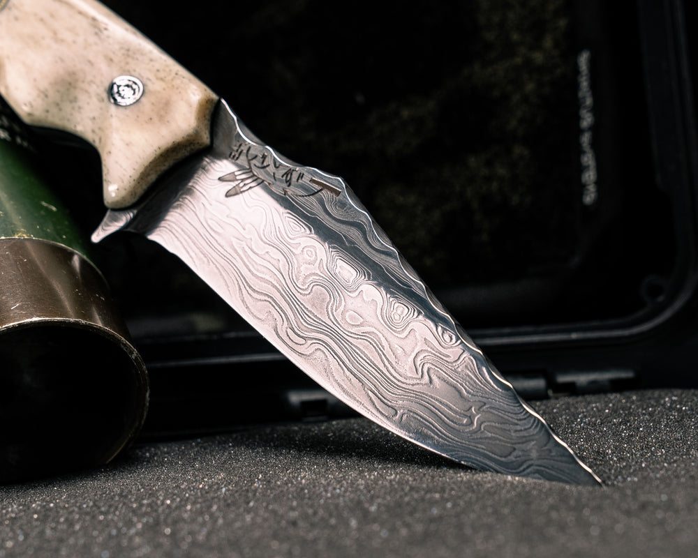 Tosahwi #01- Baker Forge Ripple 154/AEBL Core Hollow Grind Stainless Damascus- Giraffe Bone, Mosaic Pins, Center Mosaic Pin with Glow Resin, Textured Grip