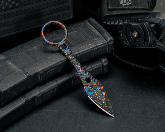 Ringstrike- 80's Rad Splatter Cerakote and Machined Rockwork Handle