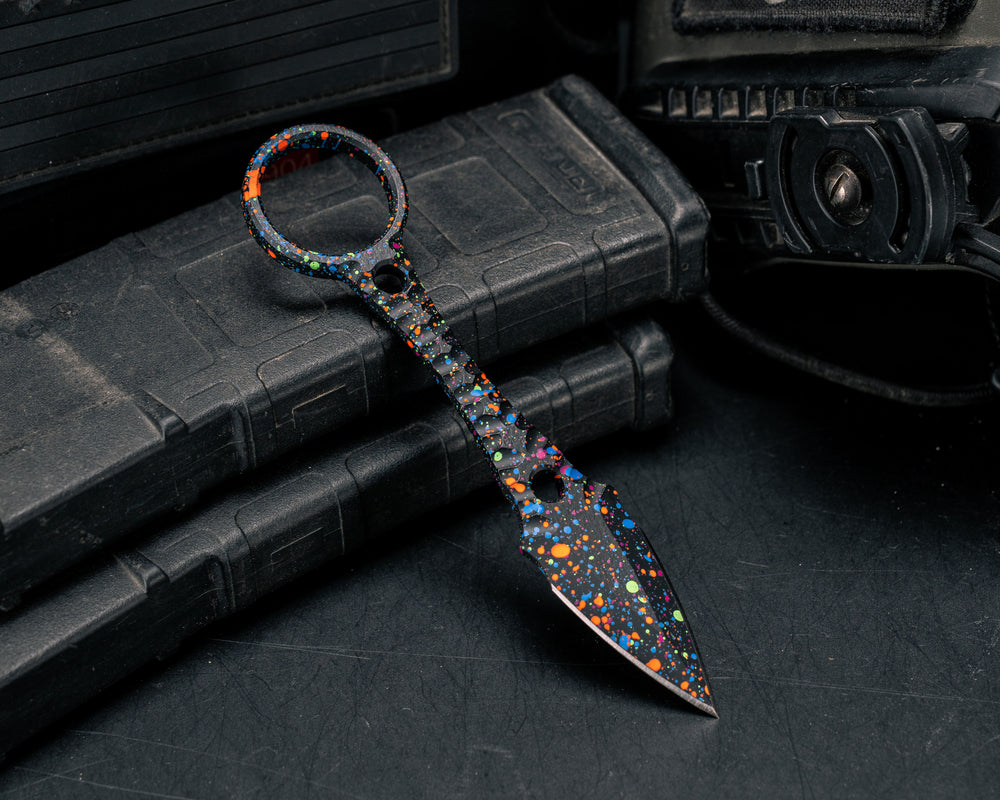 Ringstrike- 80's Rad Splatter Cerakote and Machined Rockwork Handle