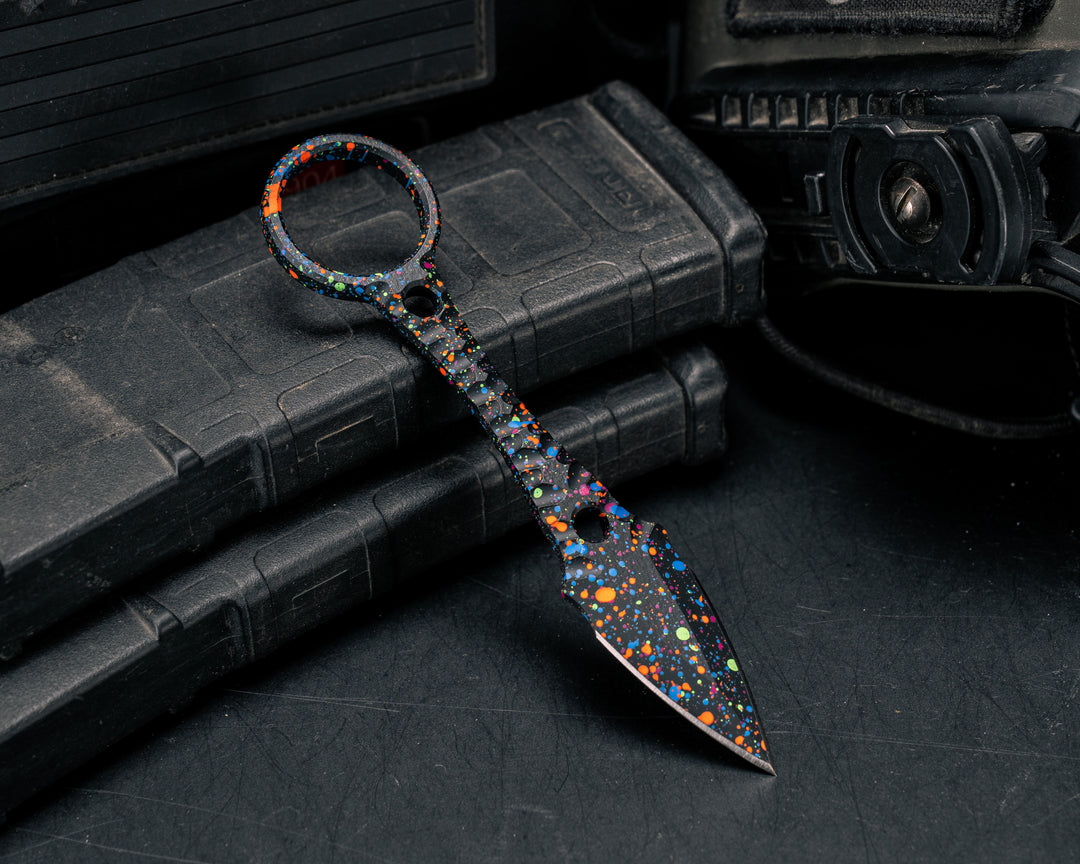 Ringstrike- 80's Rad Splatter Cerakote and Machined Rockwork Handle