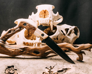 Boogeyman- dyed camel bone, redwood burl, Armor black cerakote, allen bolts, smooth grip