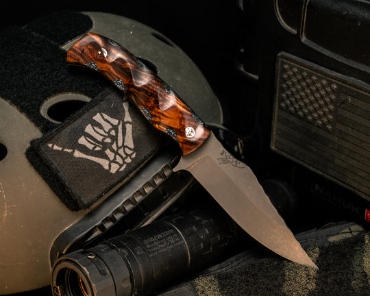 Tosahwi- Hawaiian Curly Koa Over Black and Blue Carbon with Aluminum, Copper Patriot Pins, Textured Grip