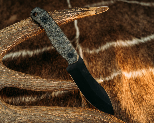 Skinner Jr- Black Canvas Micarta, Armor Black Cerakote, Allen Bolts, Chaos Grip