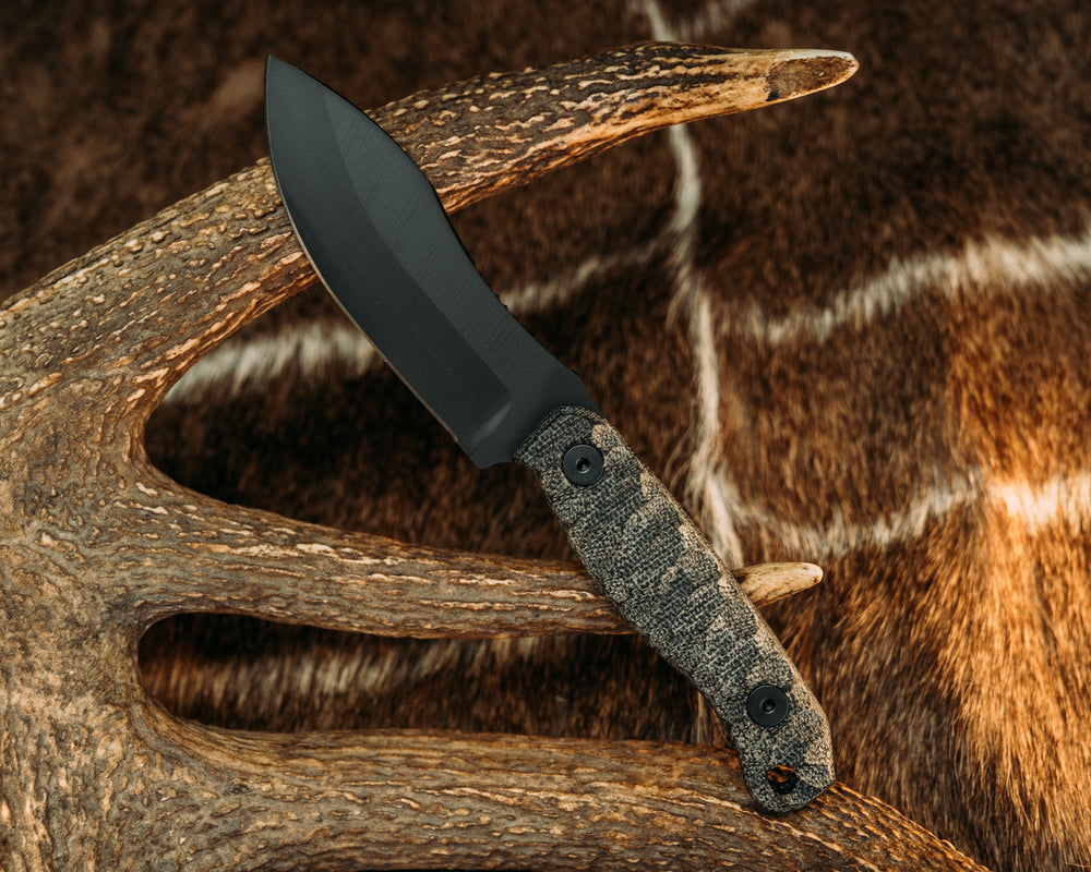 Skinner Jr- Black Canvas Micarta, Armor Black Cerakote, Allen Bolts, Chaos Grip