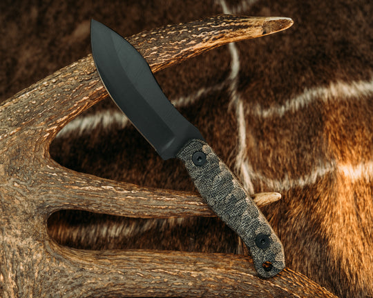 Skinner Jr- Black Canvas Micarta, Armor Black Cerakote, Allen Bolts, Chaos Grip