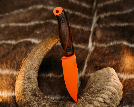 Crow Scalper - Desert Ironwood, Hunter Orange Cerakote, Allen Bolts, Smooth Grip.