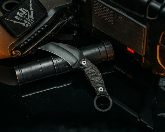Karambito - Black Canvas Micarta, Armor Cerakote, Allen Bolts, Chaos Grip.