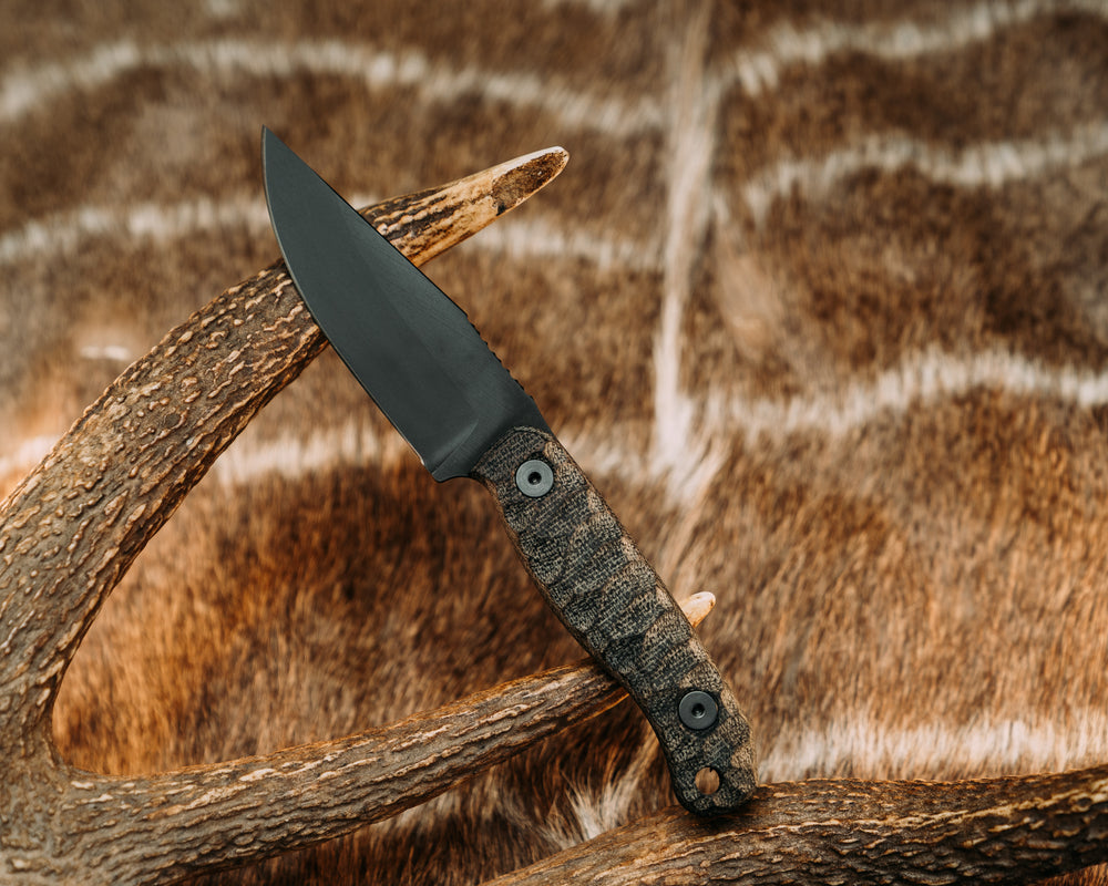 Feather Light - Black Canvas Micarta, Armor Black, Allen Bolts, Chaos Grip.