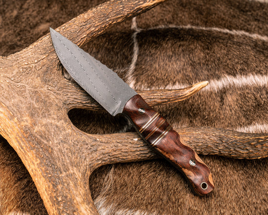 Crow Jr- Vegas Forge Herringbone Damascus, Brown Canvas Micarta, Natural Micarta, Black G10, Brass and Fiddleback Jarrah Split, Mahogany Over Mountain Ash, Mosaic Pins, Brass Lanyard Pin, Textured Grip