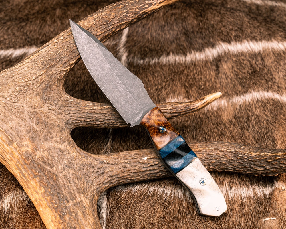 Field Knife- Amboyna Burl, Black G10, Admiral Blue Jute Micarta and Black Canvas Micarta Split, CO Elk Antler, Mosaic Pins, 1/8" Aluminum Pin, Textured Grip