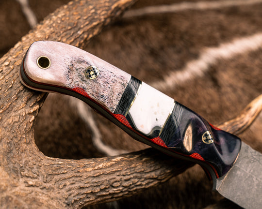 Crow Jr- Dyed Maple, Carbon, Brass and White Resin Split, CO Elk Antler Over Fire Canvas Micarta and Black G10, Mosaic Pins, Brass Lanyard Pin, Textured Grip