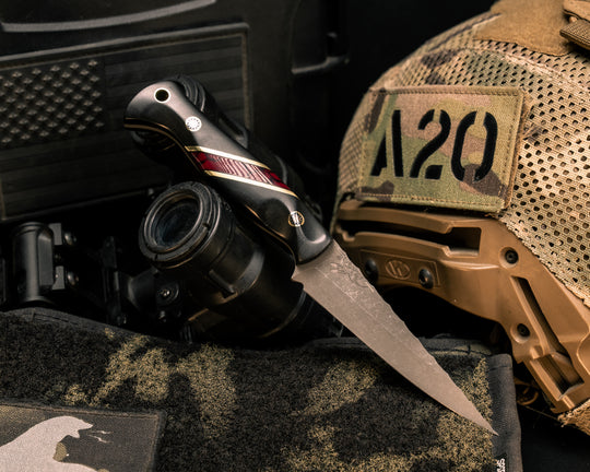 Congressman- Bison Horn, Black G10, Brass and Bloody Basin Tru-stone Split, Mosaic Pins, Brass Lanyard Pin, Textured Grip