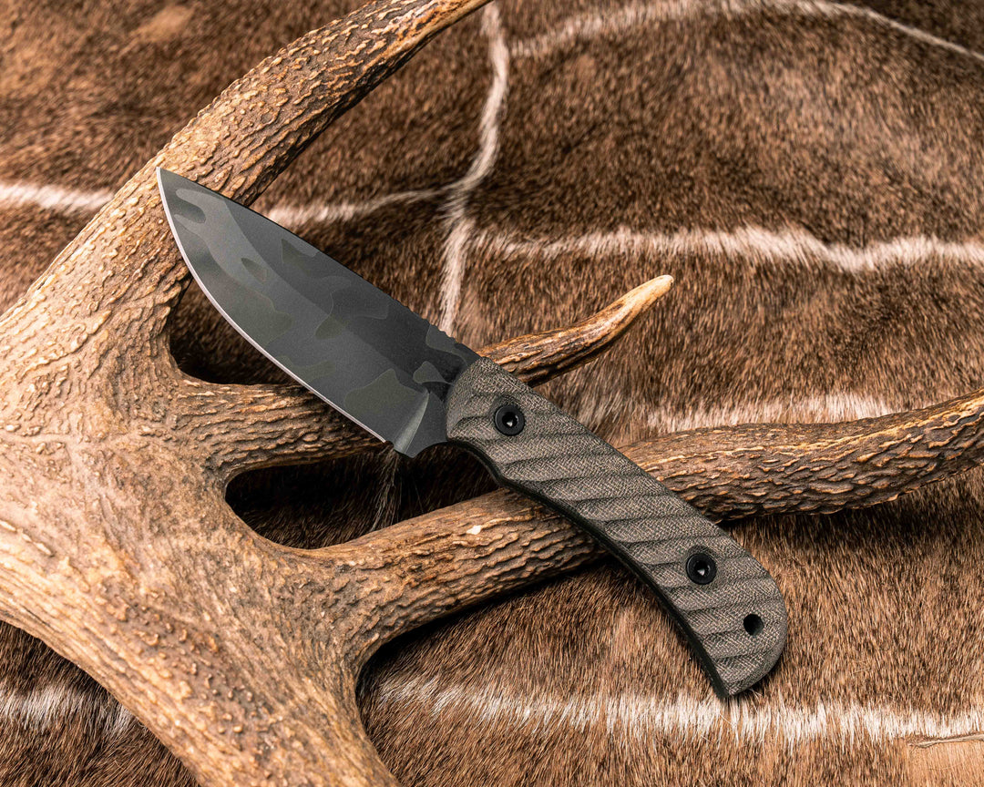 Cavner- OD Green Canvas Micarta, Black Multicam Cerakote, Allen Bolts, Textured Grip
