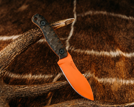 Skinner Jr- OD Green/Black Canvas Micarta, Hunter Orange Cerakote, Allen Bolts, Textured Grip
