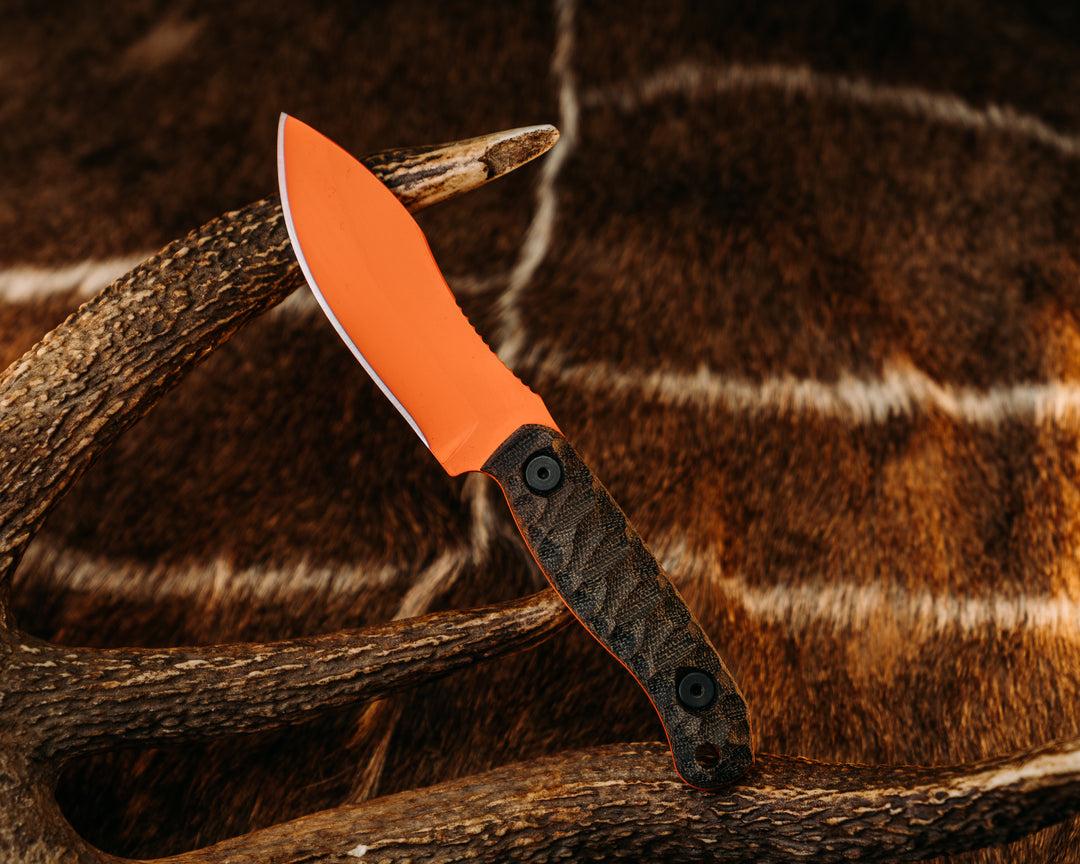 Skinner Jr- OD Green/Black Canvas Micarta, Hunter Orange Cerakote, Allen Bolts, Textured Grip