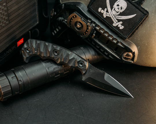 3" HUMINT - Black G10, Armor Black Cerakote, Allen Bolts, Chaos Grip.