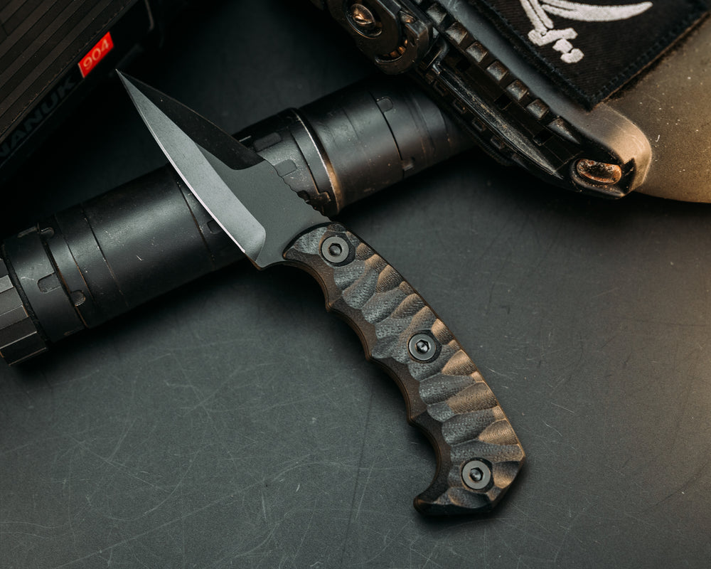 3" HUMINT - Black G10, Armor Black Cerakote, Allen Bolts, Chaos Grip.