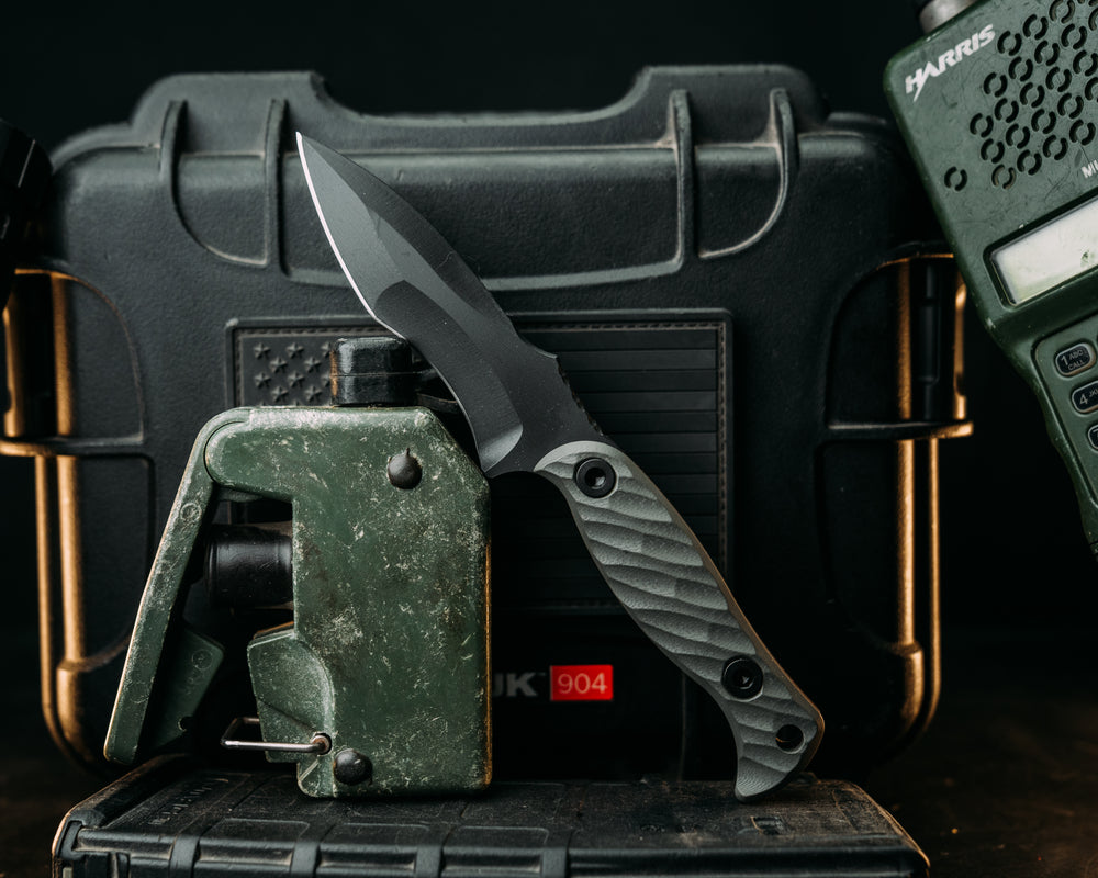 Extremis MK1 - Grey w/ Red Liner G10, Armor Black Cerakote, Allen Bolts, Hollow Lanyard Hole, Textured Grip.