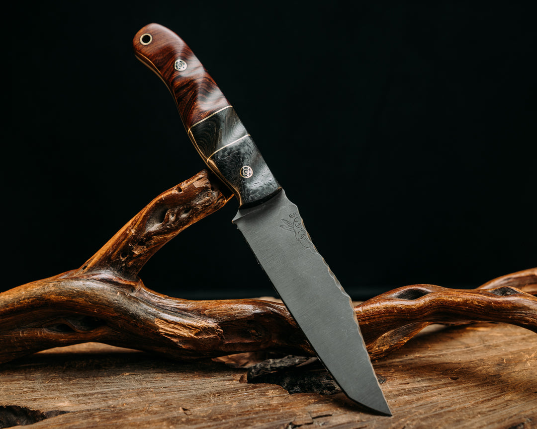 Half Face Blades X Dire Pacific Giveaway - Recurve Fighter - 400 Layered Dire Pacific Forged Damascus - Brass Bolster w/ Crystallized Titanium Guard Inlay, African Blackwood, Solid Brass Pommel, Crystalized Titanium Pommel Cap, Bronze Pins, Textured Grip.