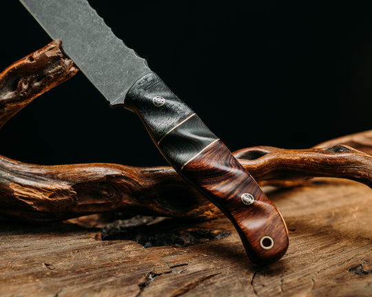 Half Face Blades X Dire Pacific Giveaway - Recurve Fighter - 400 Layered Dire Pacific Forged Damascus - Brass Bolster w/ Crystallized Titanium Guard Inlay, African Blackwood, Solid Brass Pommel, Crystalized Titanium Pommel Cap, Bronze Pins, Textured Grip.