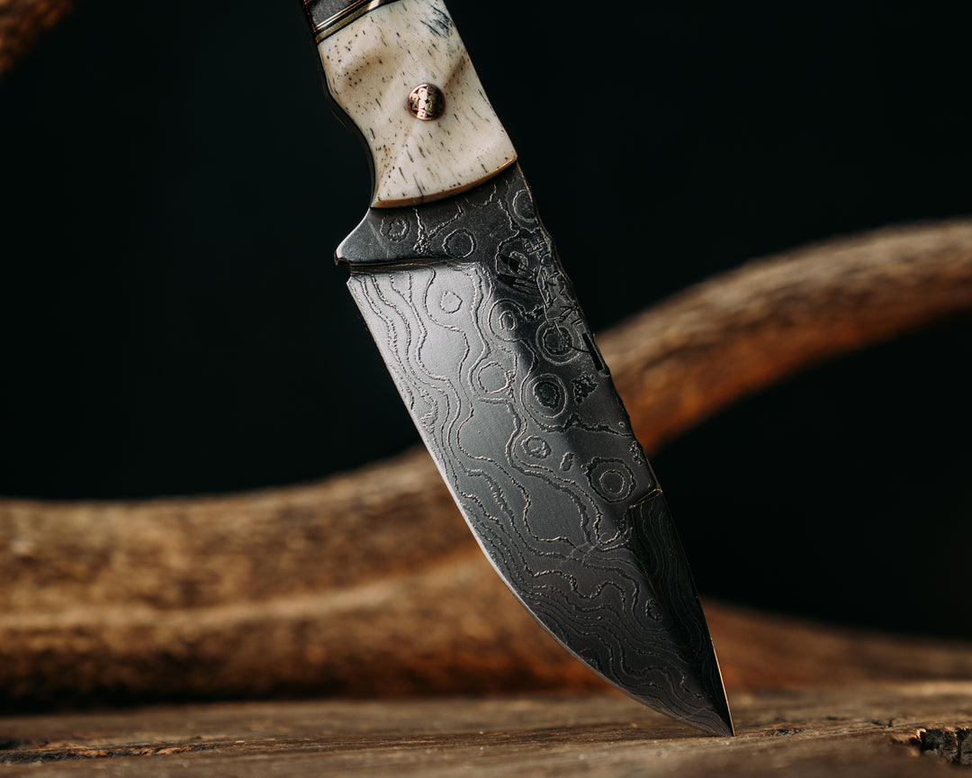 Cavner- Baker Forge Polished Random Pattern Damascus- Giraffe Bone, Black G10, Brass and Cherry G10 Pin Striping, Brown Canvas Micarta Split, Snakewood, Old School CAV Logo Mosaic Pins, Brass Lanyard Pin, Textured Grip
