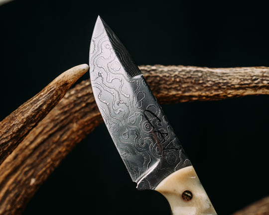 Cavner- Baker Forge Polished Random Pattern Damascus- Giraffe Bone, Black G10, Brass and Cherry G10 Pin Striping, Brown Canvas Micarta Split, Snakewood, Old School CAV Logo Mosaic Pins, Brass Lanyard Pin, Textured Grip