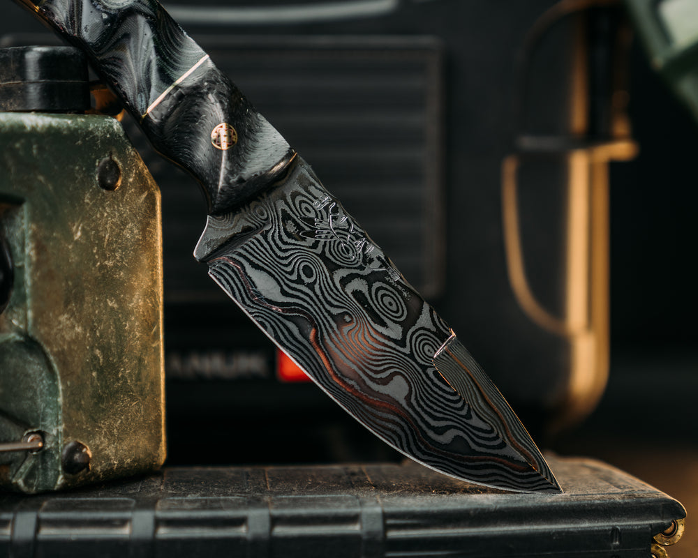 Cavner- Baker Forge GoMai CuShim (DamCore) Raindrop Pattern- Carbon Fiber, Brass Pin Striping, American Flag and Navy S.E.A.L AOR2 Cammie Micarta Split, Mosaic Pins, Brass Lanyard Pin, Textured Grip