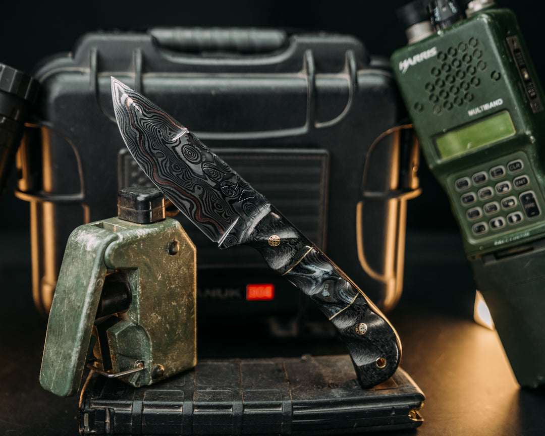 Cavner- Baker Forge GoMai CuShim (DamCore) Raindrop Pattern- Carbon Fiber, Brass Pin Striping, American Flag and Navy S.E.A.L AOR2 Cammie Micarta Split, Mosaic Pins, Brass Lanyard Pin, Textured Grip